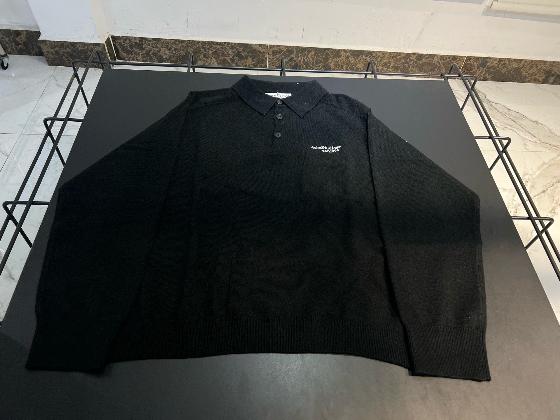 Polo En laine tricotée noir