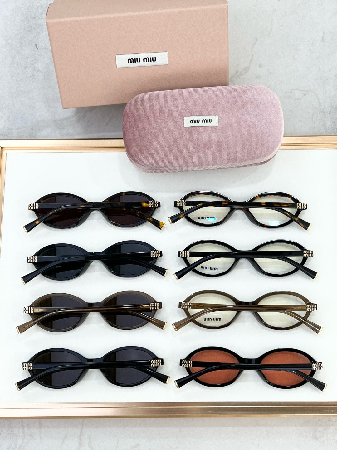 MIU MIU OMU 01XV