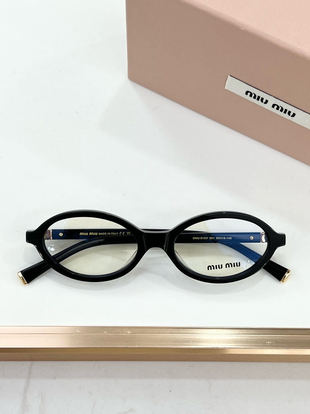 MIU MIU OMU 01XV