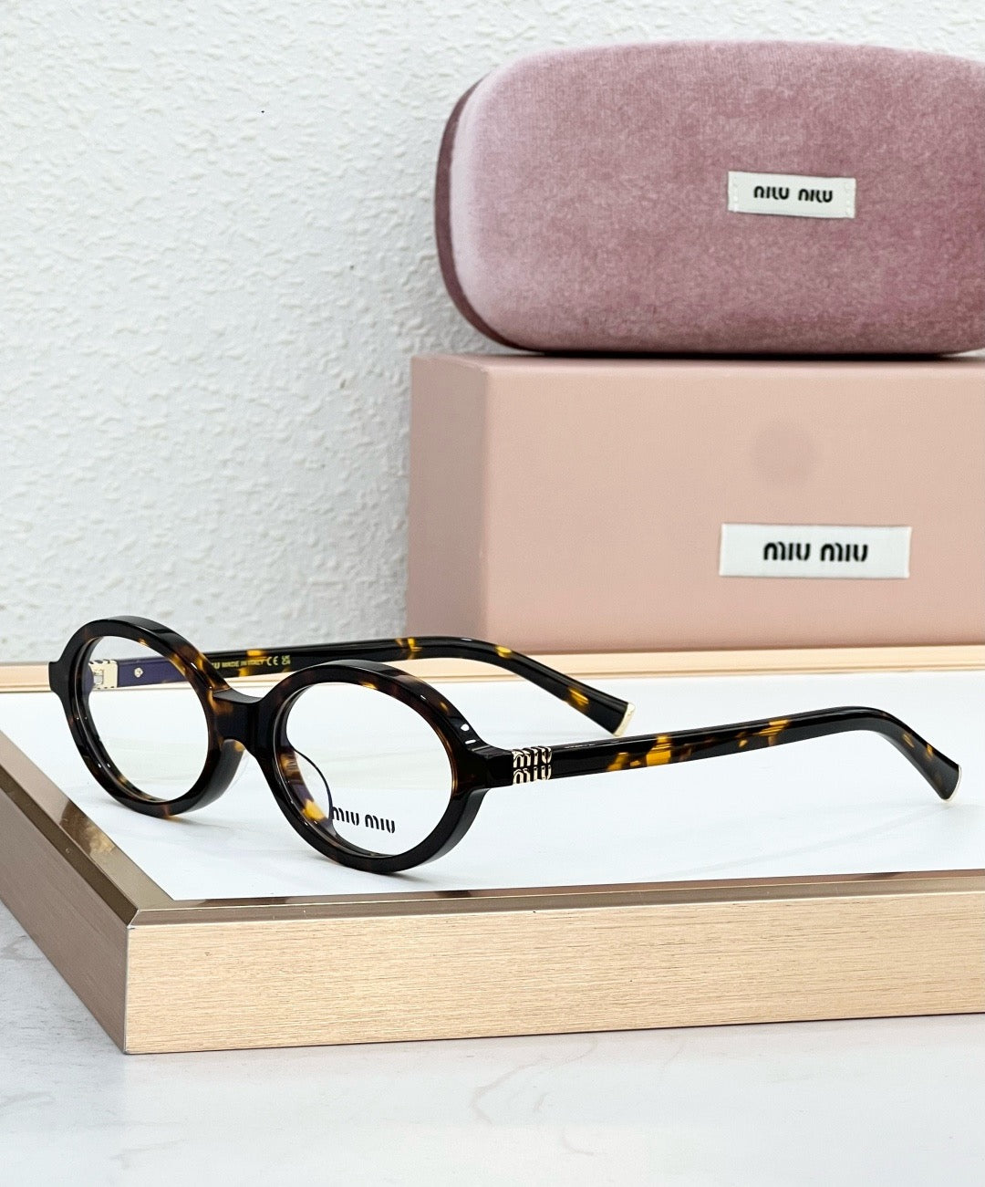 MIU MIU OMU 01XV