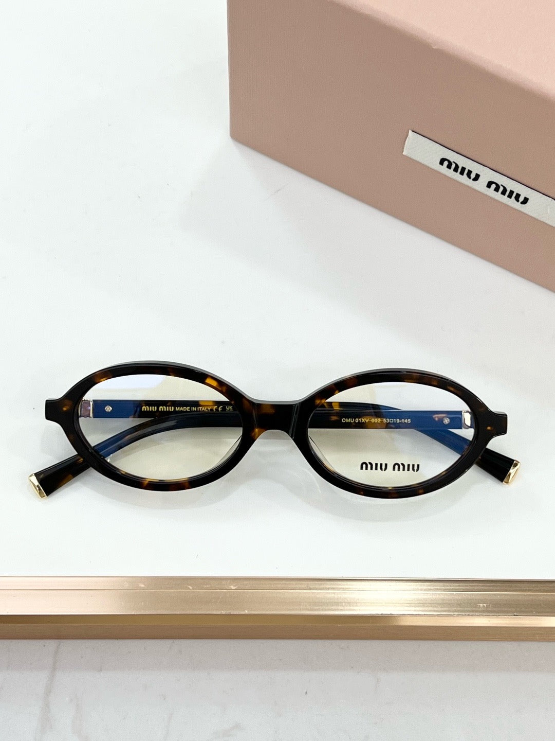 MIU MIU OMU 01XV