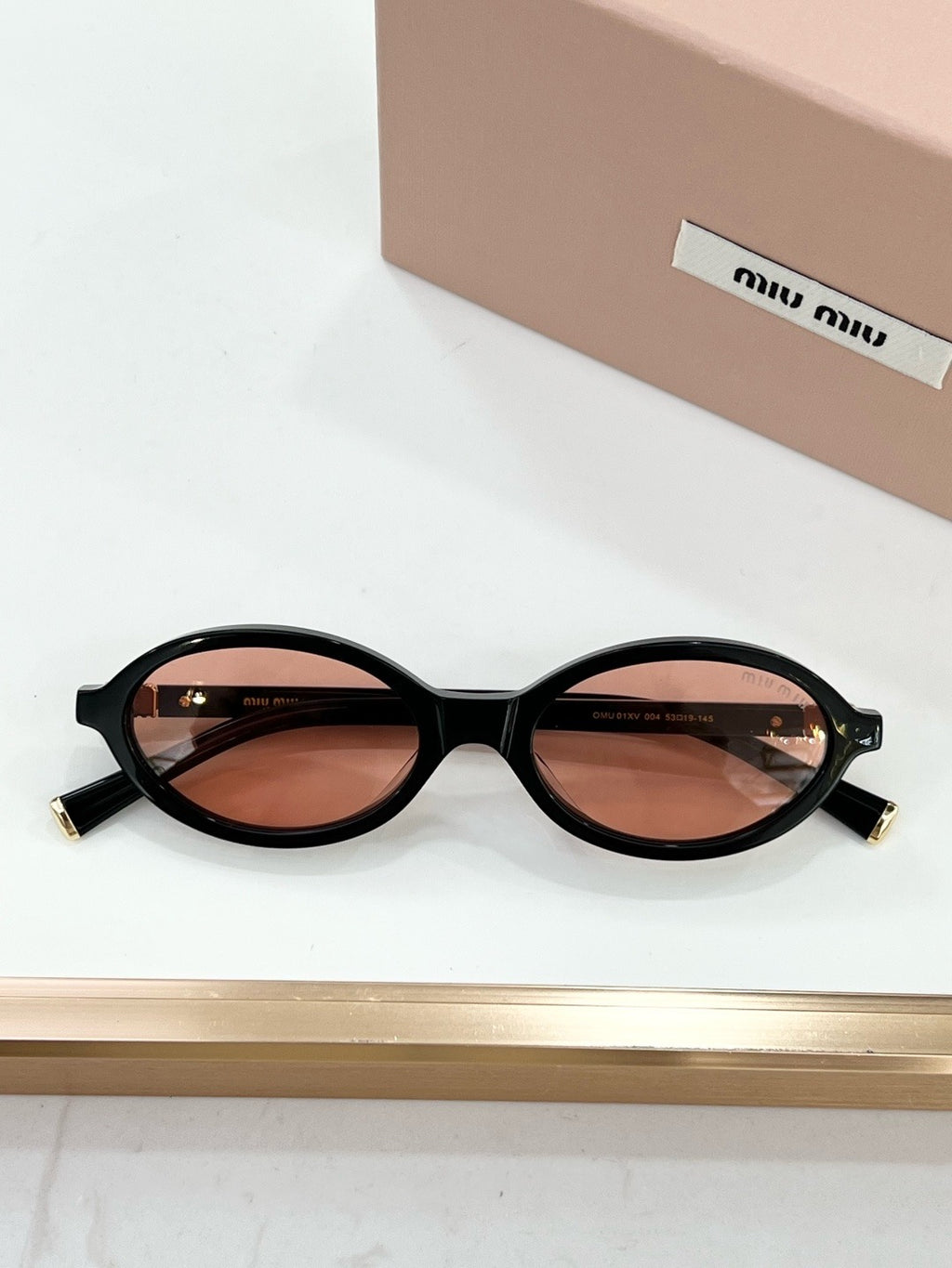 MIU MIU OMU 01XV