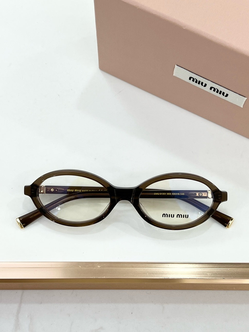 MIU MIU OMU 01XV