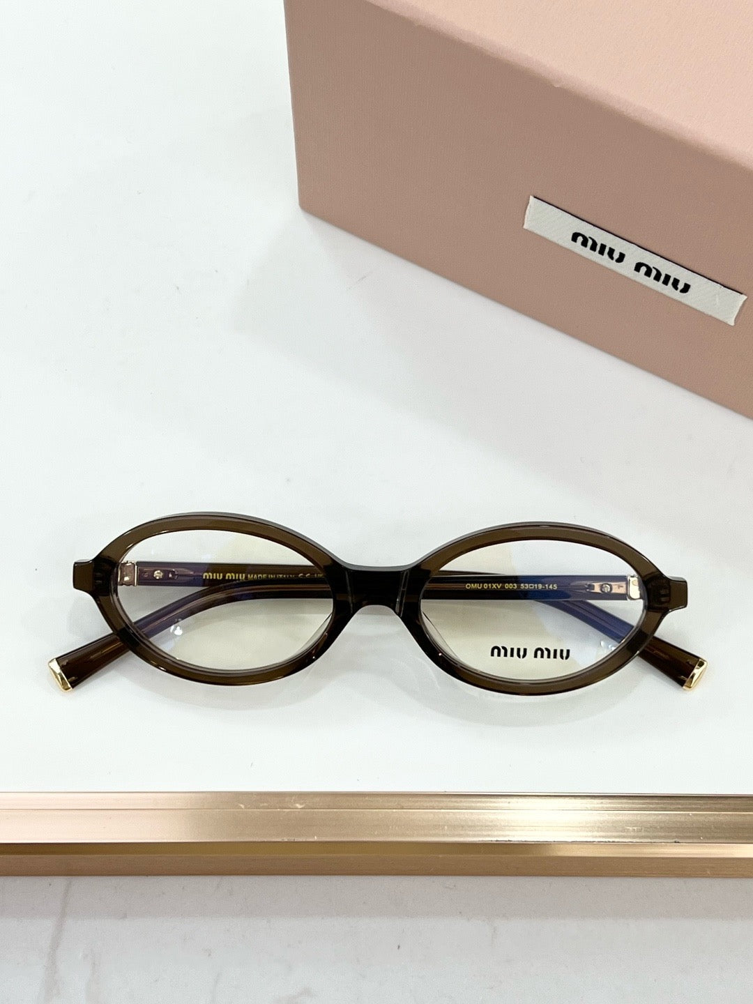MIU MIU OMU 01XV
