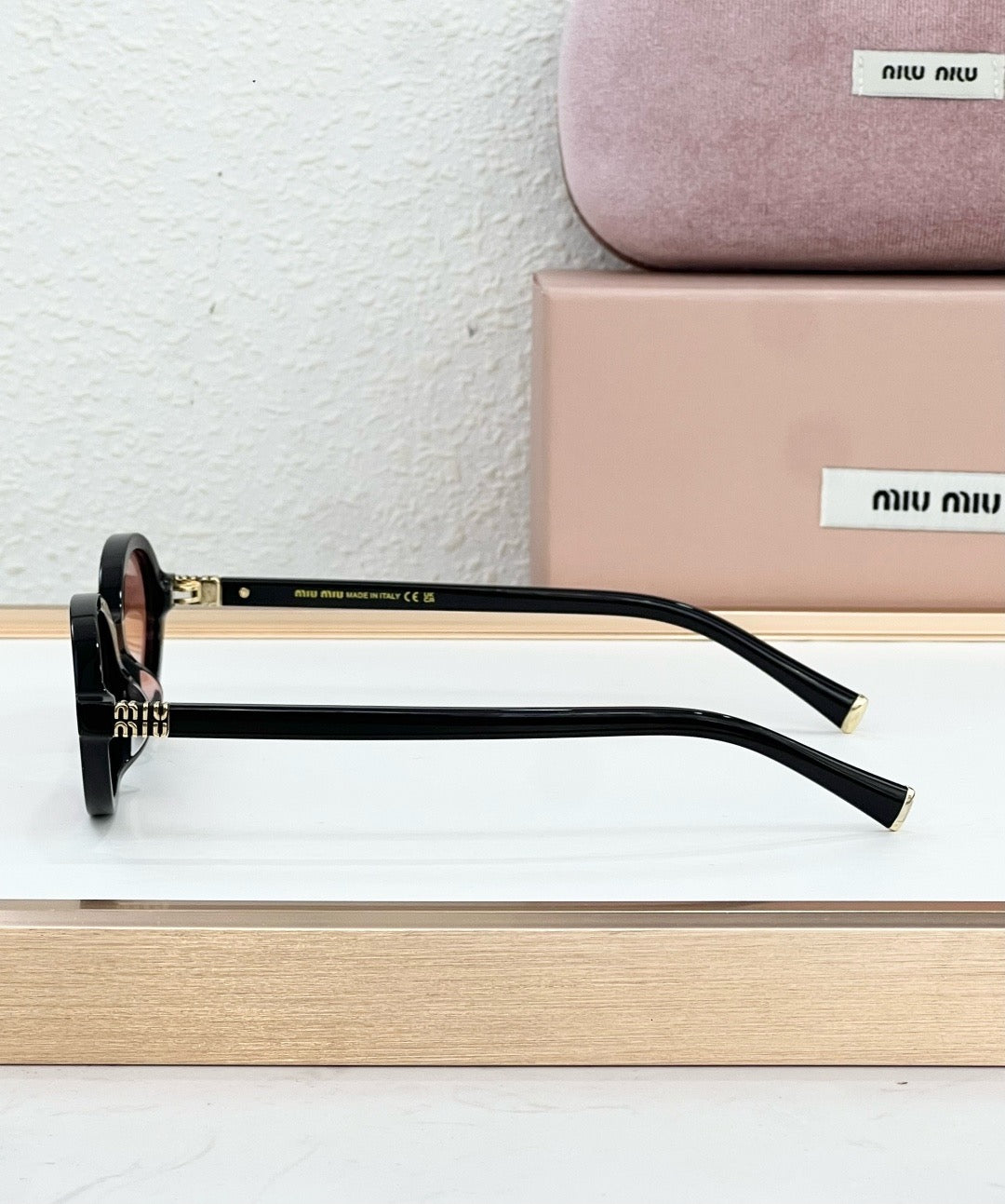MIU MIU OMU 01XV