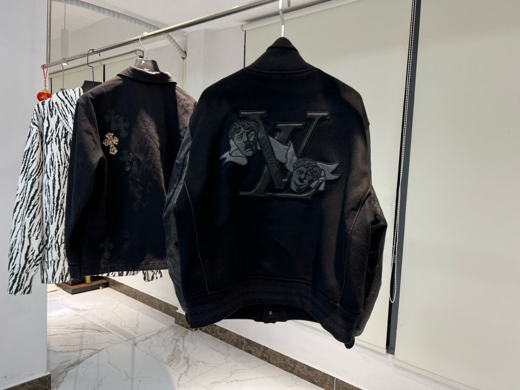 Blouson embossé monogram en cuir et laine