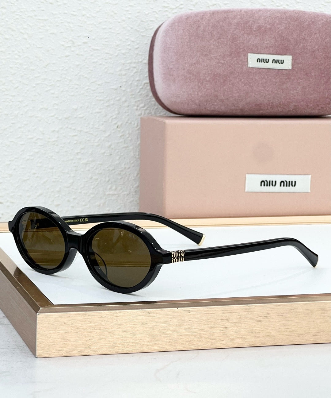 MIU MIU OMU 01XV