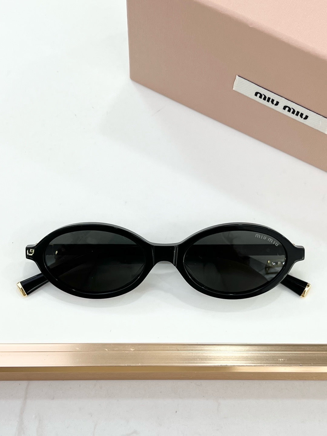 MIU MIU OMU 01XV