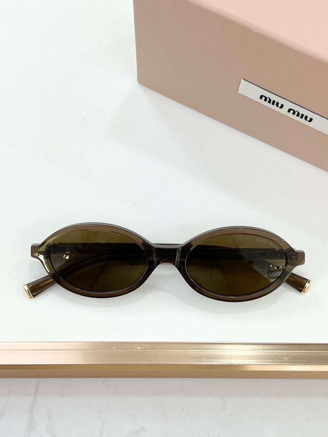 MIU MIU OMU 01XV