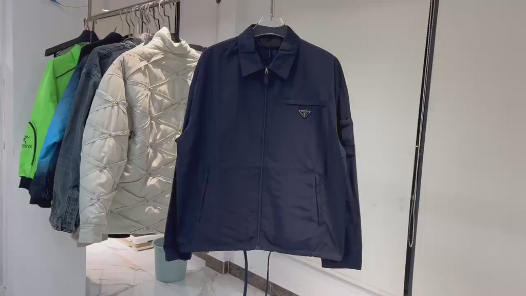 Prada veste zippée à plaque logo Bleu marine