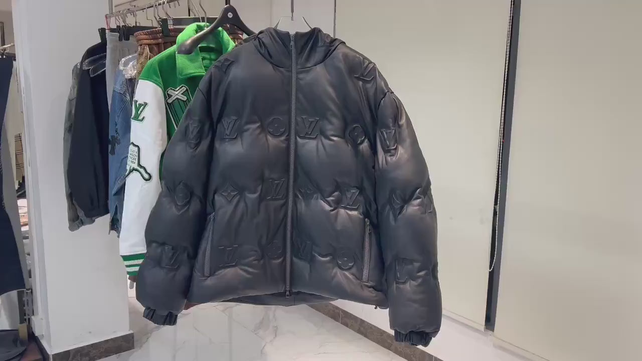 Doudoune Monogram en cuir à capuche